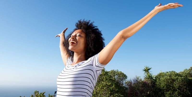 woman with hands in the air