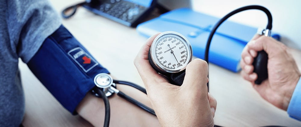 patient having blood pressure checked