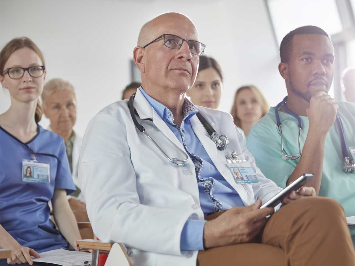 Doctors listening to a lecture