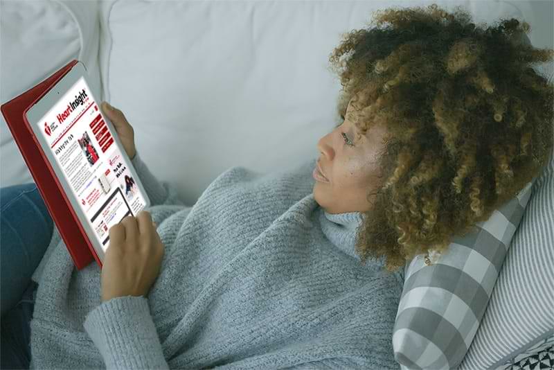 Woman reading Heart Insight on tablet Woman reading Heart Insight on tablet